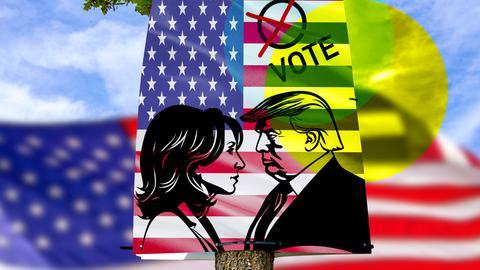 Ein Plakat, auf dem Trump und Harris als Zeichnung zu sehen sind, darüber steht "Vote"