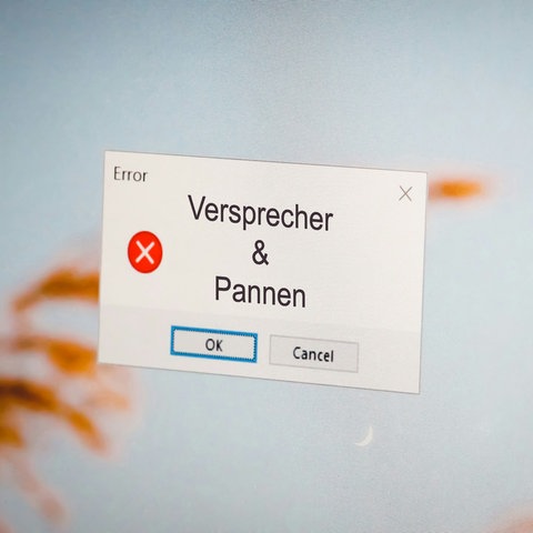 Eine Fehlermeldung auf einem Computermonitor mit dem Text: Pannen & Versprecher